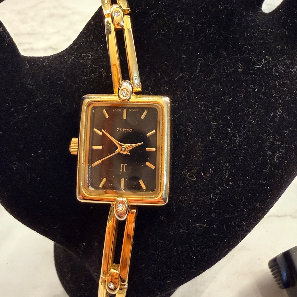 Elegant Gold and Black Women's Watch